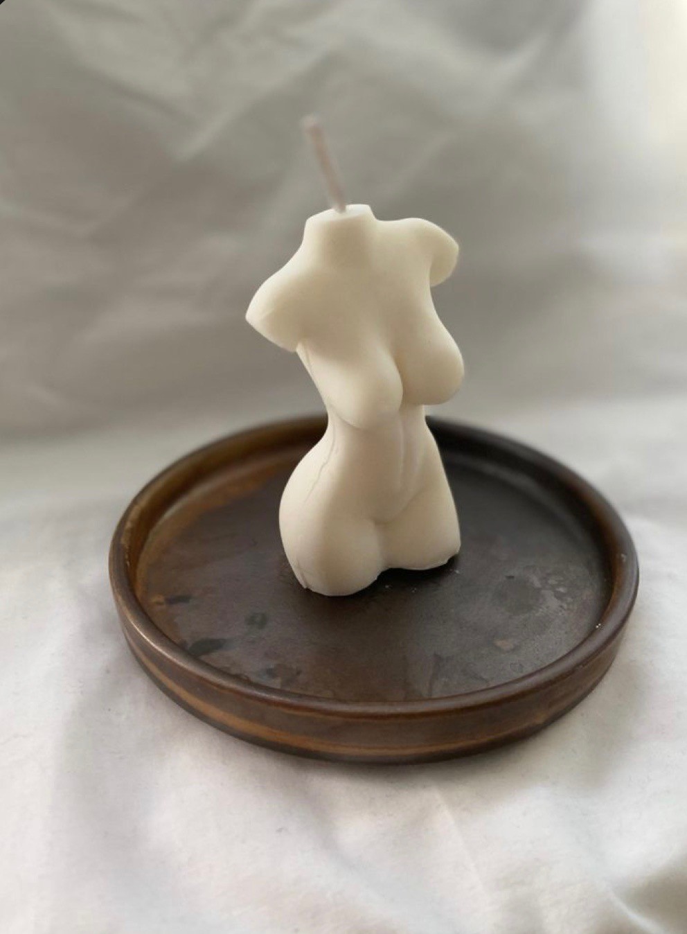 woman's body candle